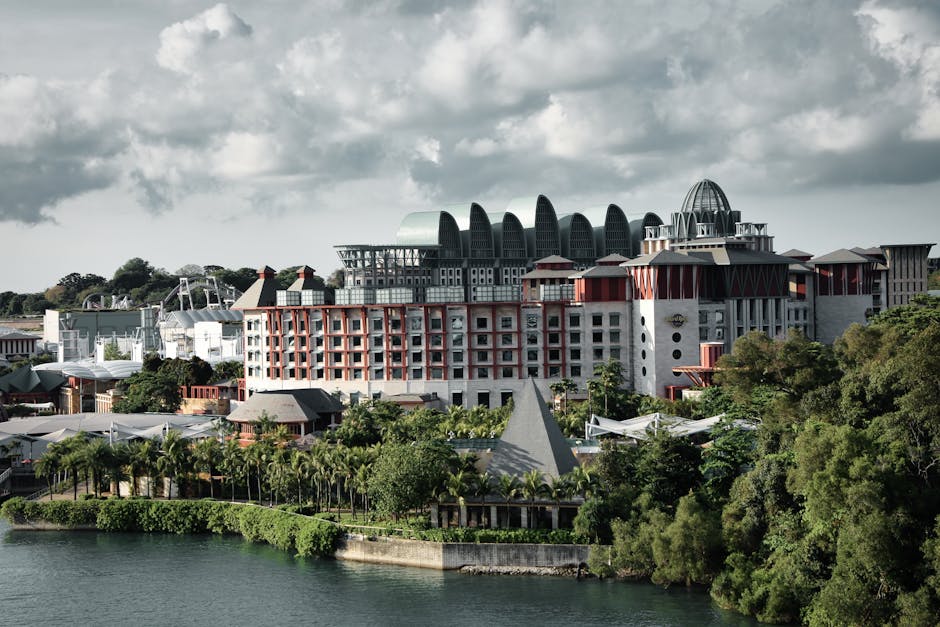 A stunning view of Resort World Sentosa Singapore with lush greenery and distinctive architecture.