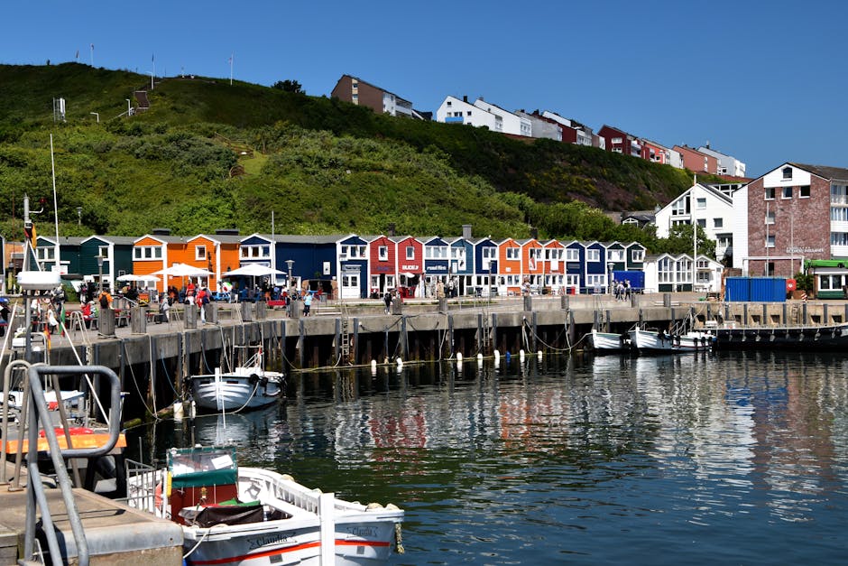 Vibrant and colorful harbor scene in Helgoland, Germany, during a sunny summer day.